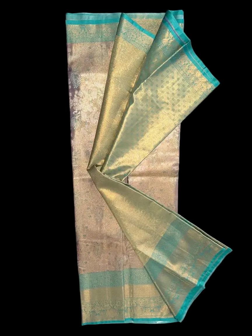 Antique gold Kanchipuram silk saree with floral and geometric patterning, body detail view