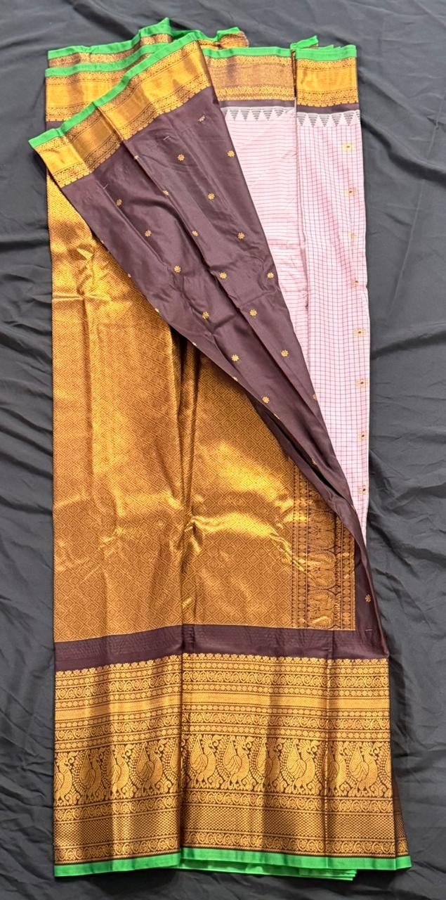 Light orchid purple Kanchipuram silk saree with butta and checked pattern, ornate gold border, and floral pallu, draped product view