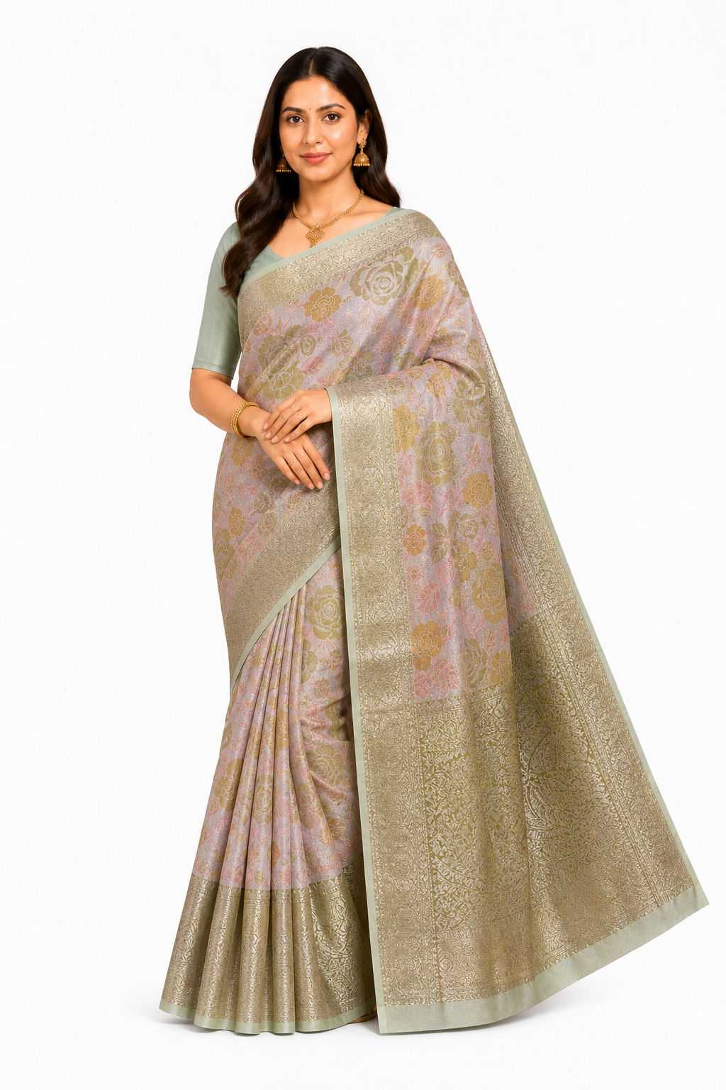 Adult South Asian woman wearing blush-pink floral Semi Kanchivaram saree with olive roses and champagne-gold border