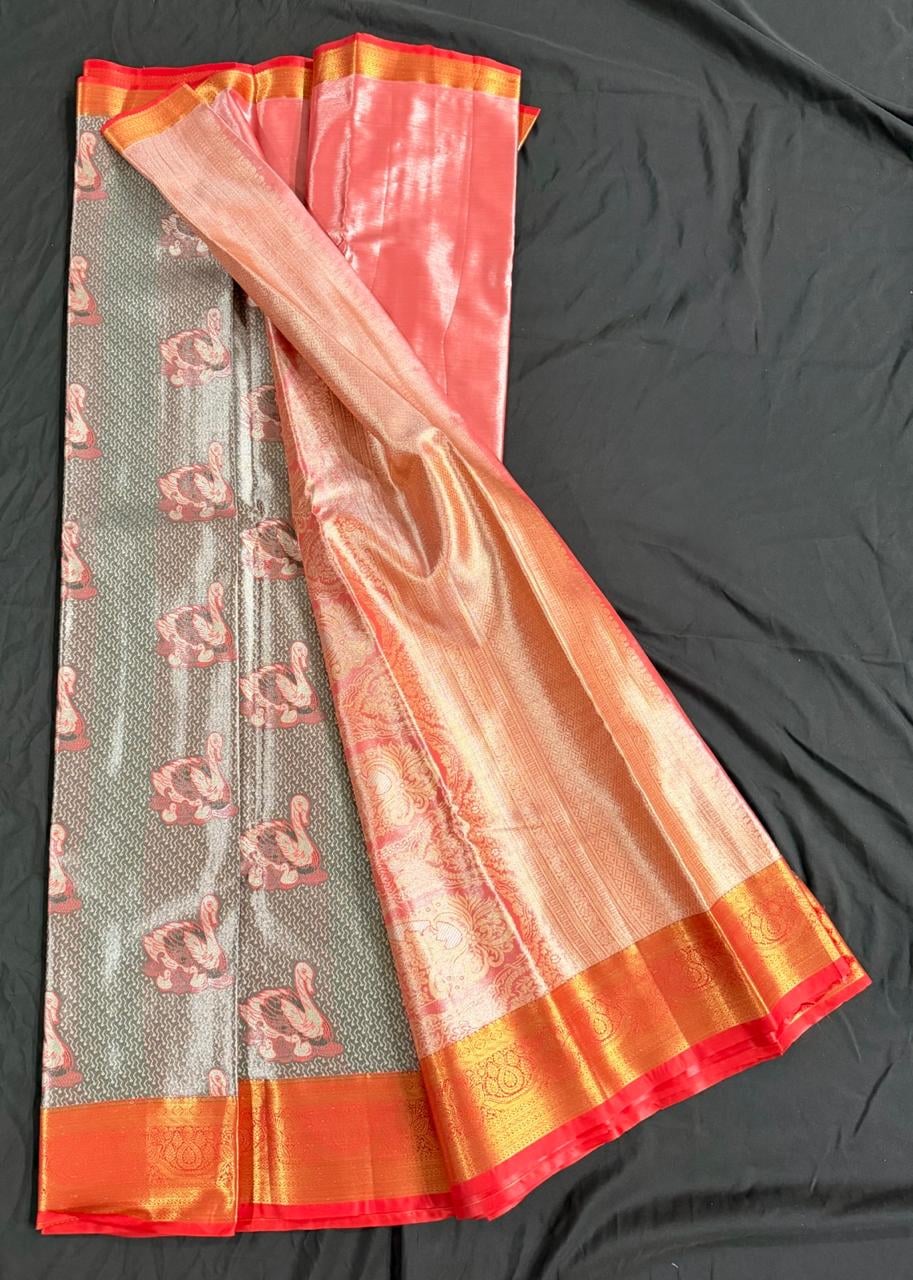 Silver grey Kanchipuram silk saree with peacock motifs and red-gold ornamental border, draped product view