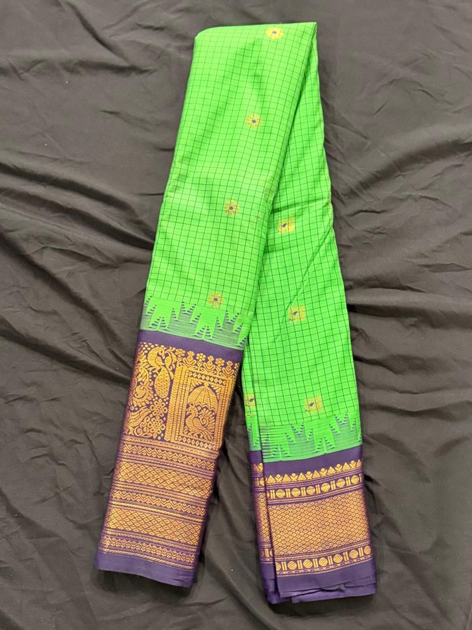 Bright lime green Kanchipuram silk saree with checks and butta motifs, body detail view